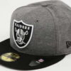 New Era 5950 Jersey Essential Raiders melange tmavě šedá / černá 7 1/8 (56.8 cm)