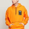 Puma Recheck Pack Graphic Hoodie oranžová L